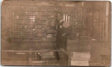 Vintage Postcard Early Postal Clerk Sorting Mail Post Office Interior RPPC  picture