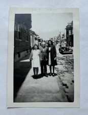 Vtg B&W Snapshot Family Group Sidewalk City Street Classic Car Background picture