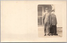 c1910s Real Photo RPPC Postcard Well-Dressed Couple in Front of House - Unused picture