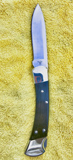 New Buck 110 Drop Point, Nickel Silver Bolsters, Ebony Scales picture