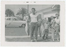 Man Holding Huge Fish Cigarette in Mouth Car Family Funny VTG Photo 1950s picture