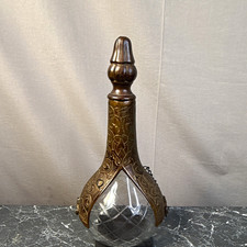 antique lock-caged claret or liquor decanter with bronze metal on cut glass picture
