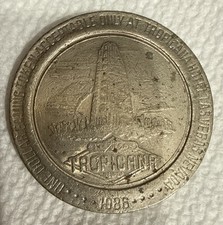 TROPICANA A RAMADA RESORT CASINO 1986 $1 ONE DOLLAR GAMING COIN/TOKEN -Las Vegas picture
