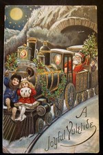 SANTA CLAUS~on Train with Children~SNOW TREE MOON-TOYS~Gel~CHRISTMAS POSTCARD~ picture