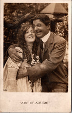 Postcard Real Photo RPPC Man Winking Holding Young Woman A Bit of Alright 1906 picture