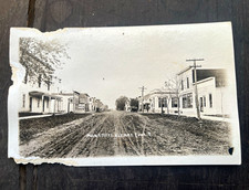 The Co-Mo Company Klemme Iowa Main Street Scene RPPC Photo Postcard Original picture
