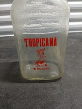 Vintage Tropicana Glass Bottle Hula Girl With Lid Orange Juice Clear Glass 64oz picture