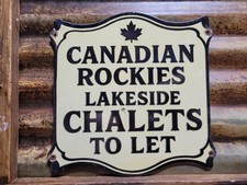 VINTAGE ROCKY MOUNTAINS PORCELAIN SIGN OLD CANADA ROCKIES LAKE CABIN LODGE CAMP picture