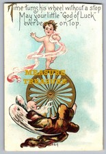 C.1911 GOD OF LUCK CHERUB ON TOP OF TIME TURNING HIS WHEEL Postcard Q10 picture