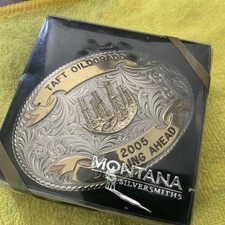 custom Montana Silversmiths belt buckle from 2005 featuring a