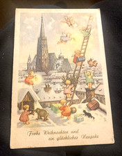Antique Austrian Christmas Postcard featuring Cherubs & St. Stephen's Cathedral picture