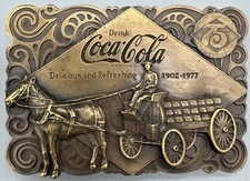 VINTAGE 1976 COCA COLA 75th ANNIVERSARY BRASS BELT BUCKLE - BOTTLE OPENER NOS picture