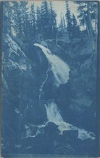 1915 Waterfall over rocky terrain RPPC Antique Postcard picture
