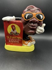 Vintage 1987 Sun-Maid California Raisins Rubber Coin Bank picture